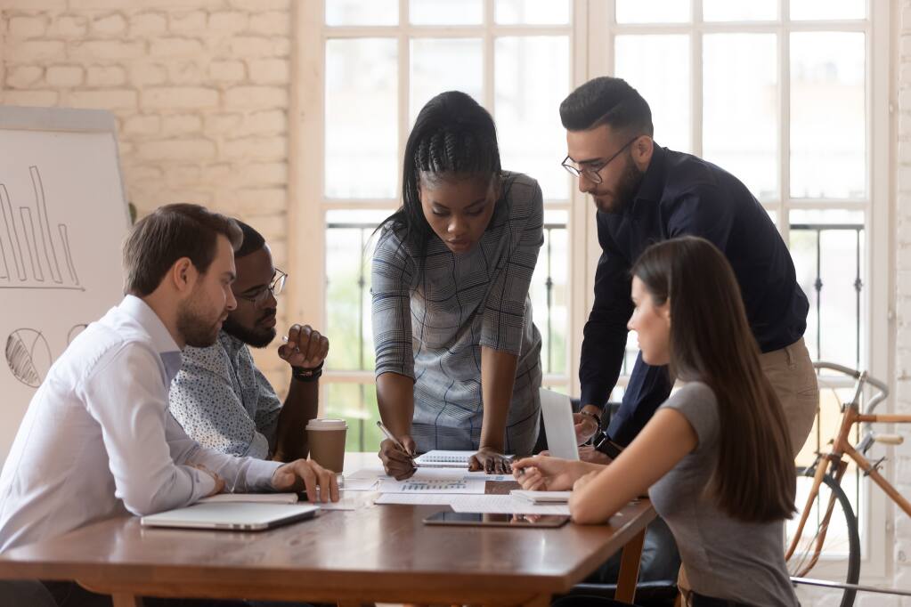 Diverse,Colleagues,Working,On,Project,Together,Lead,By,Team,Leader